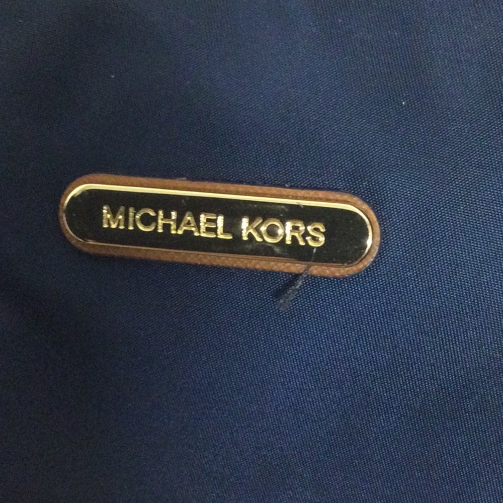 Michael Kors  rain proof purse . - Picture 7 of 8
